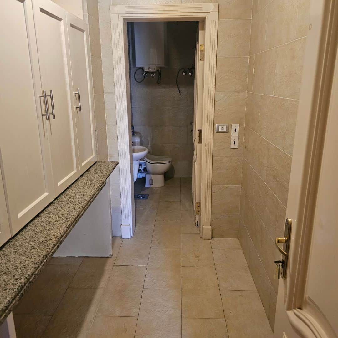 Bright interior bathroom and kitchen space in a furnished apartment in Maadi, Cairo Egypt for rent.